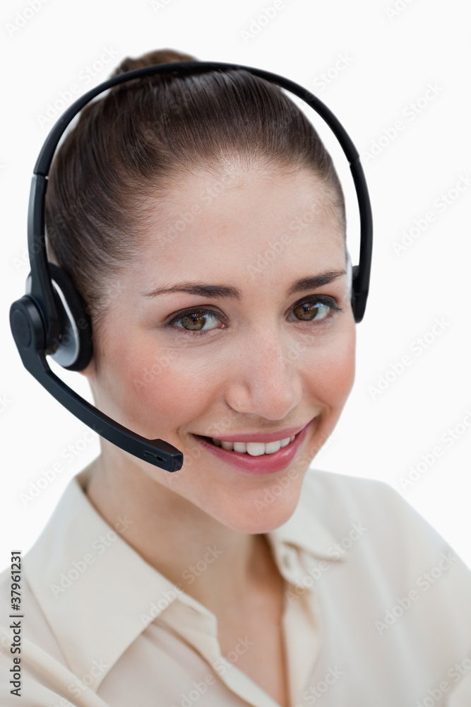 Portrait of a happy operator posing with a headset Portrait of a happy operator posing with a headset