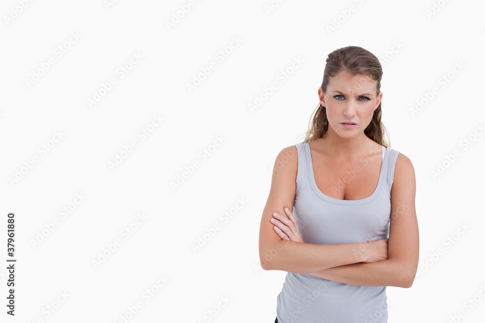 Unhappy woman with the arms crossed Unhappy woman with the arms crossed