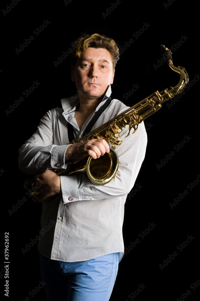 Fototapeta premium Portrait of a young saxophonist
