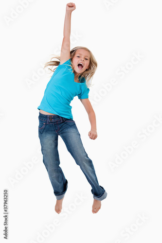 Portrait of a cheerful girl jumping