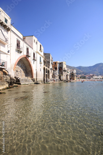 Crystal clear water on the medieval seafront at Cefalu