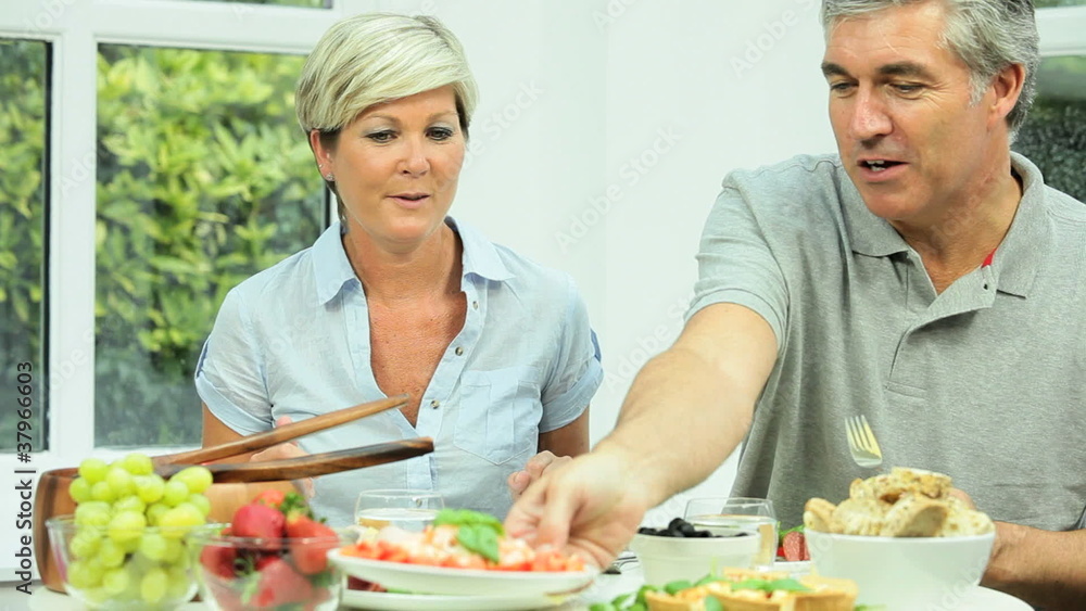 Middle Aged Couple Eating Healthy Fresh Food Middle Aged Couple Eating Healthy Fresh Food