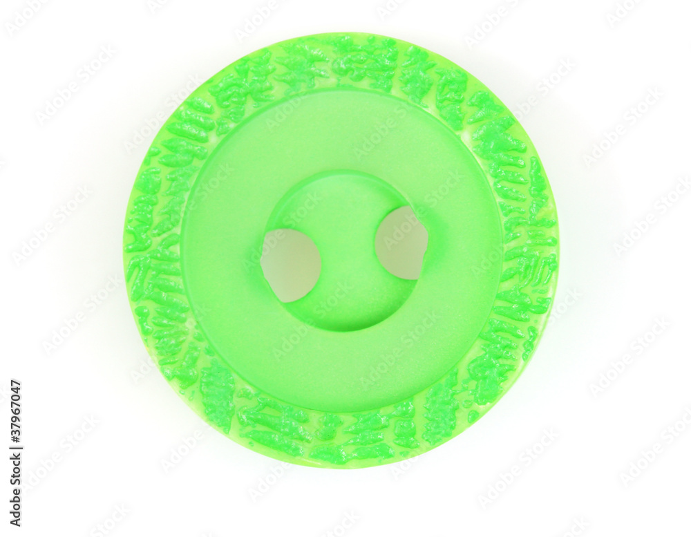 bright green sewing button isolated on white. bright green sewing button isolated on white.