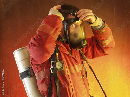Tableau sur toile Bombero en un incendio.