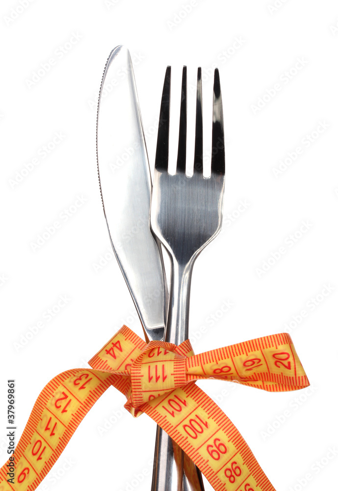 Fork, knife and measuring tape isolated on white Fork, knife and measuring tape isolated on white