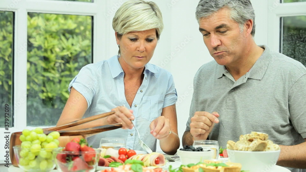 Mature Couple Sharing Healthy Lunch Mature Couple Sharing Healthy Lunch