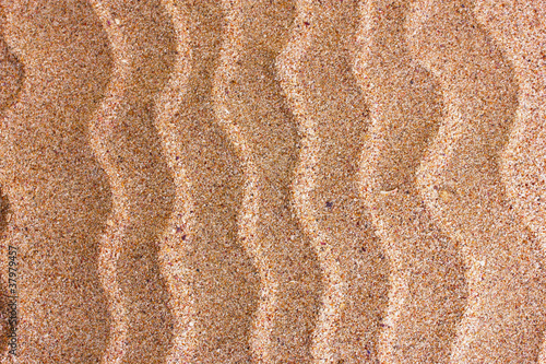 Waves on the sand background