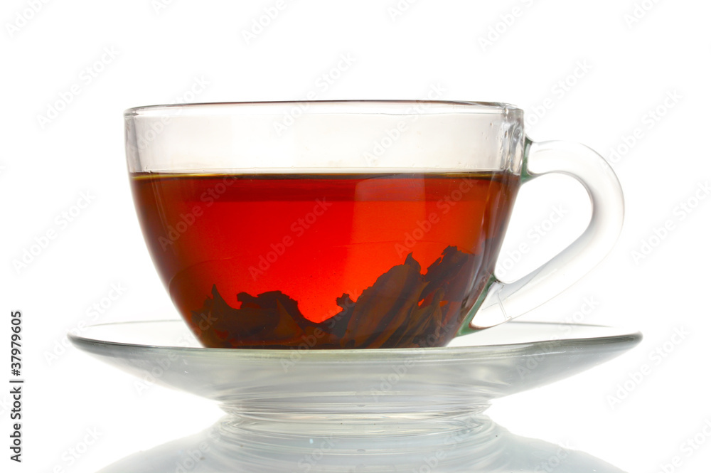 Black tea in glass cup isolated on white Black tea in glass cup isolated on white