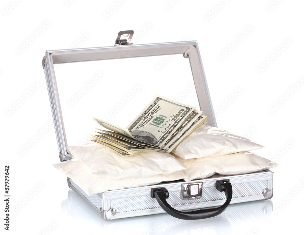Сocaine with money in a suitcase isolated on white Сocaine with money in a suitcase isolated on white