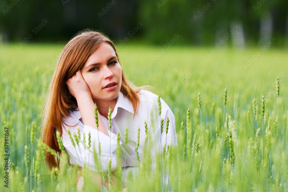 Young woman in a field Young woman in a field