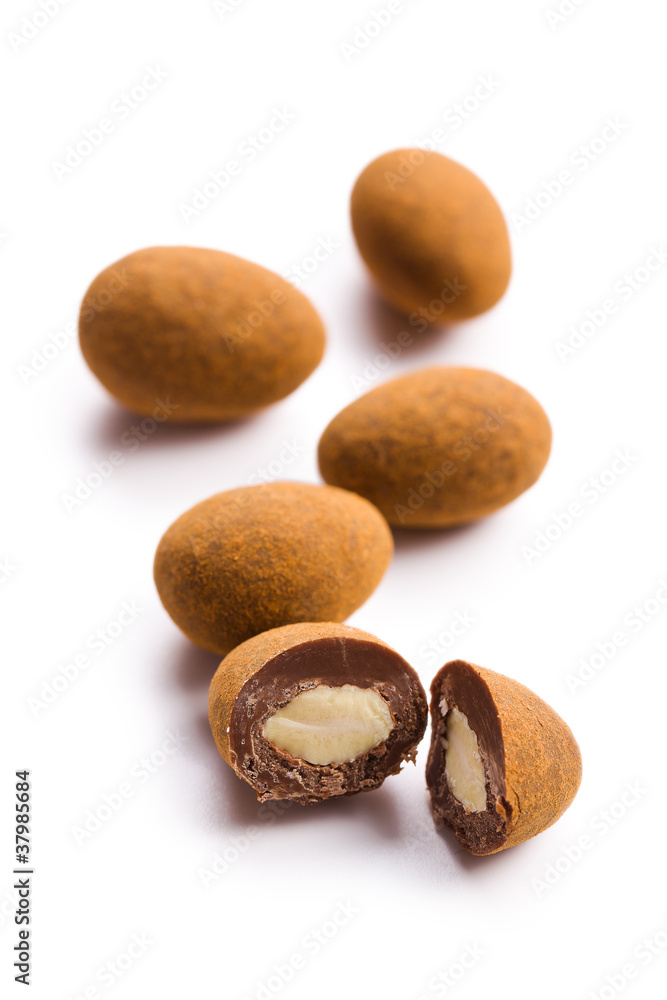 Fototapeta premium almonds in chocolate with cinnamon