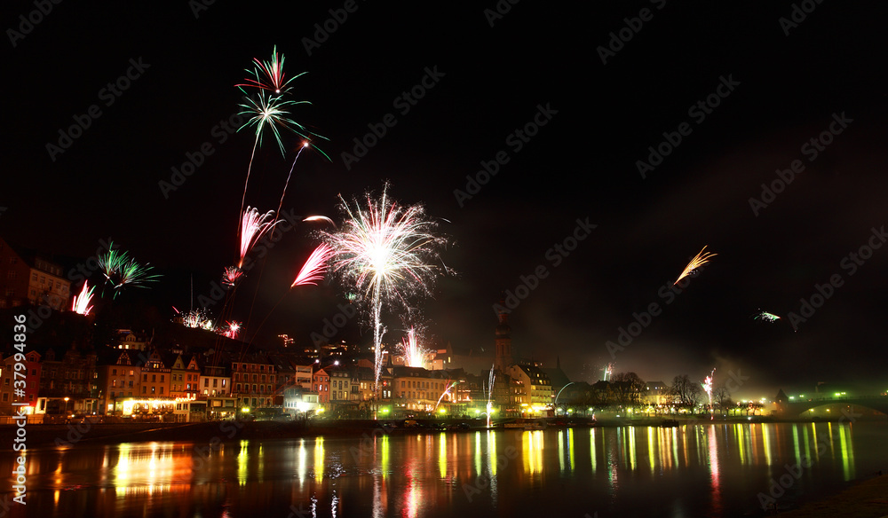 colorful fireworks close to river