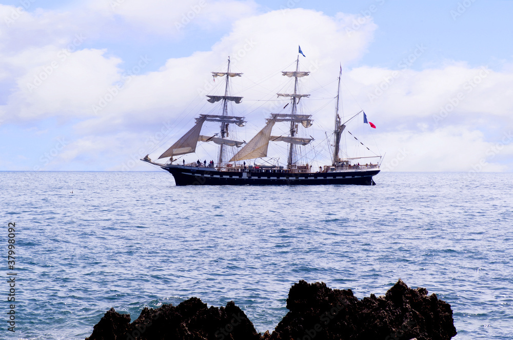 sailing ship and the rocks of the Sirens Isle of Capri Italy sailing ship and the rocks of the Sirens Isle of Capri Italy