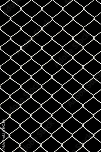 chain link fence isolated on black
