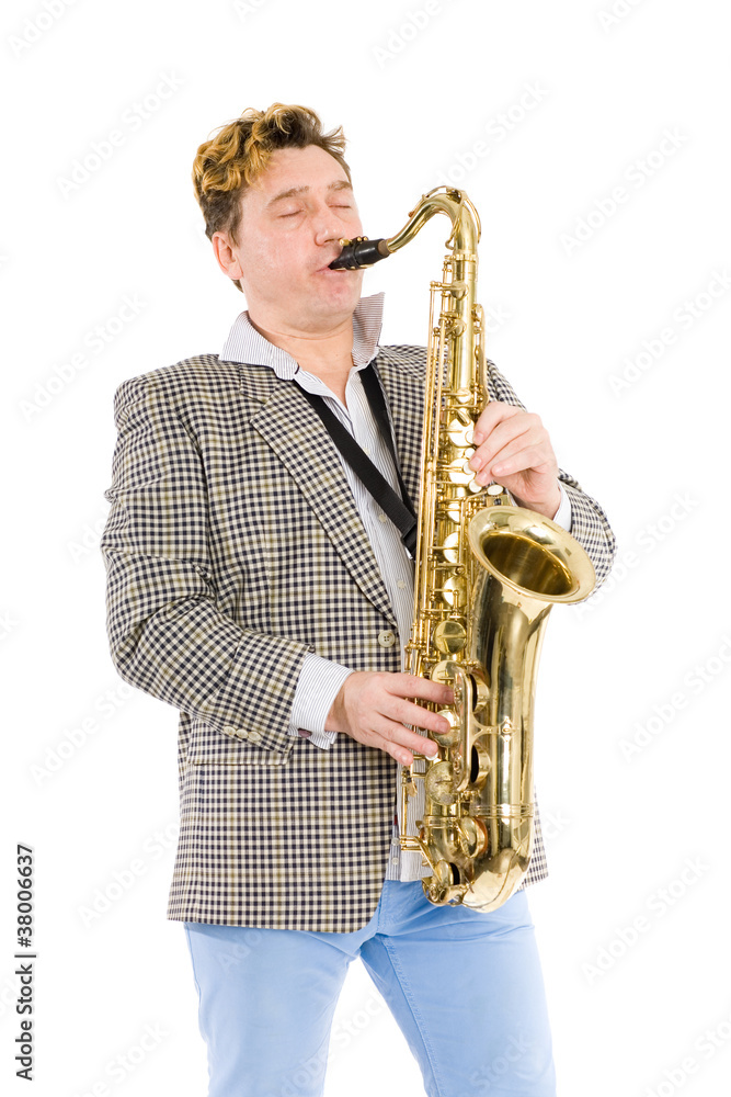 Fototapeta premium Man plays the saxophone with his eyes closed