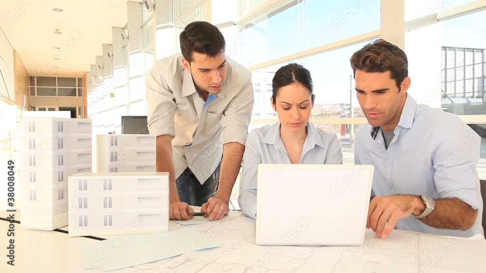 Team of architects working on project Team of architects working on project