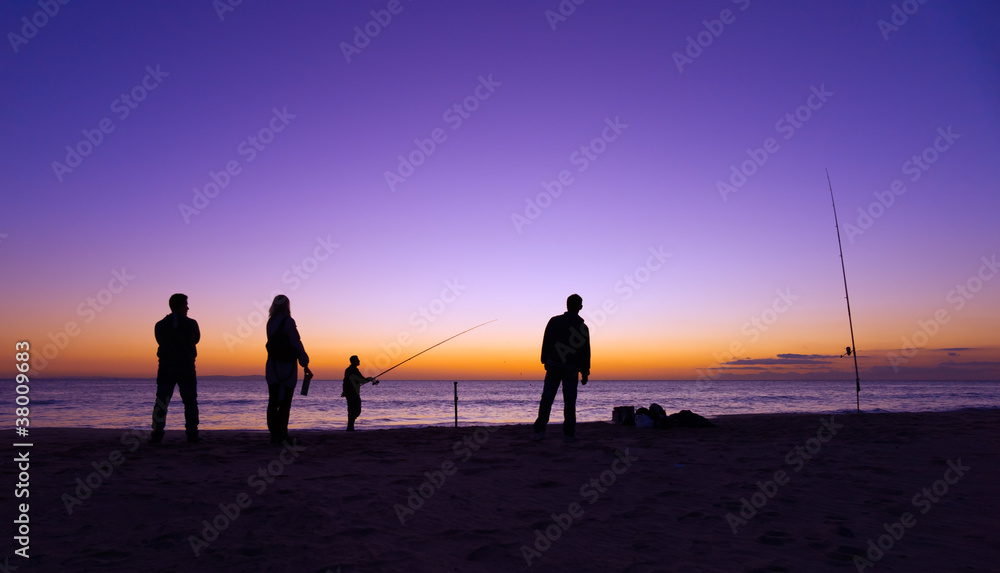 Angler im Sonnenuntergang