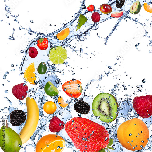 Fruits falling in water splash, isolated on white background