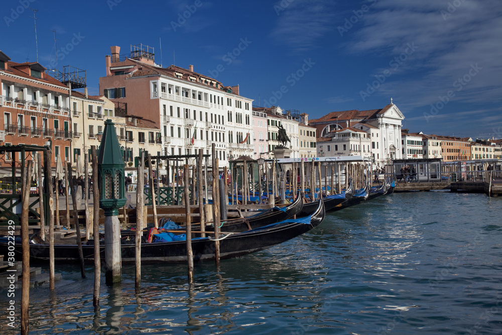 Venice cityscape with gondolas.