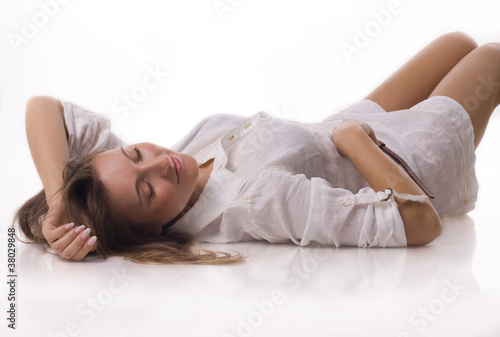 Beautiful girl lying on a floor