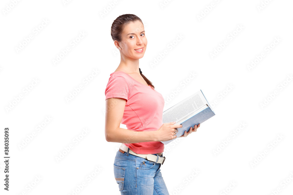 A school girl holding a book A school girl holding a book