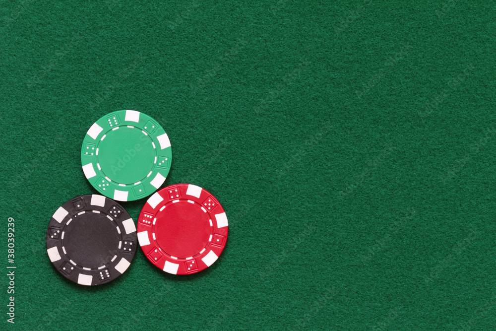 regulere Kro Hammer poker chips over table layout Stock Photo | Adobe Stock