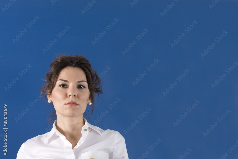 Image of young woman thinking on green board