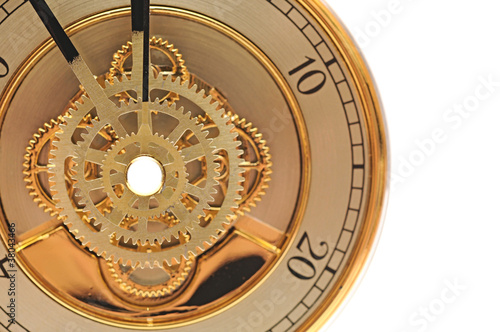 closeup golden clock with gears