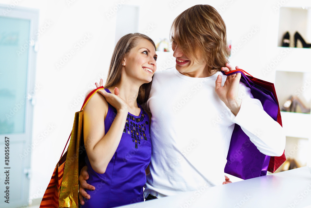 Young couple doing shopping together Young couple doing shopping together