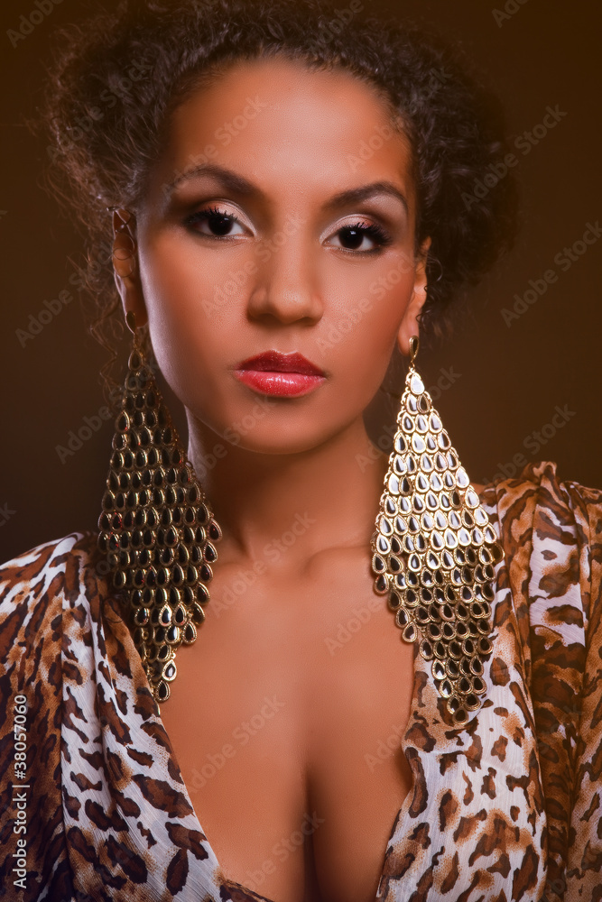 portrait of a beautiful dark-skinned woman in the studio portrait of a beautiful dark-skinned woman in the studio