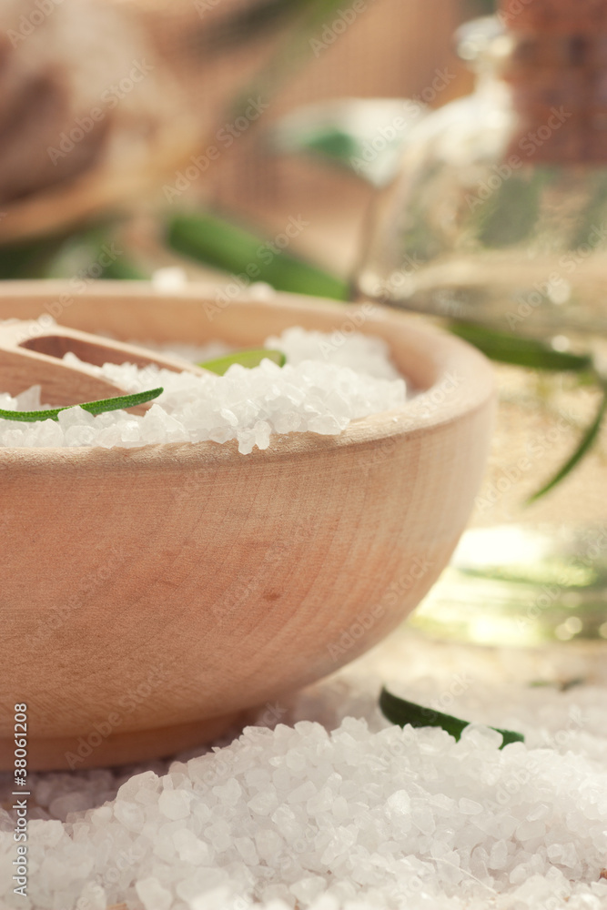 Spa setting with bath salt and floral water Spa setting with bath salt and floral water
