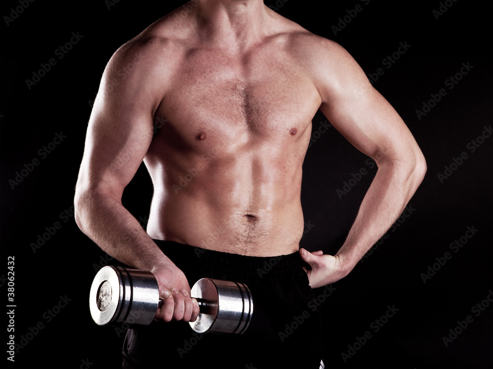 muscular powerful man lifting metal weights muscular powerful man lifting metal weights