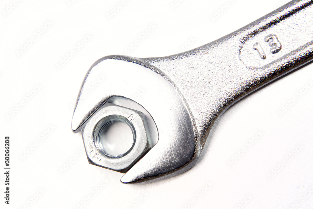 Steel spanner and nut together Steel spanner and nut together