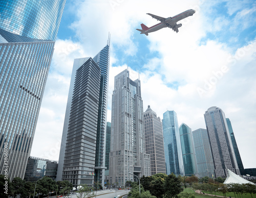 shanghai financial district and airplane