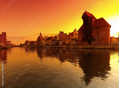 Sunset cityscape with vibrant colors. Gdansk, Poland.