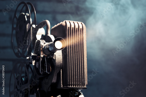 old film projector with dramatic lighting #38070643