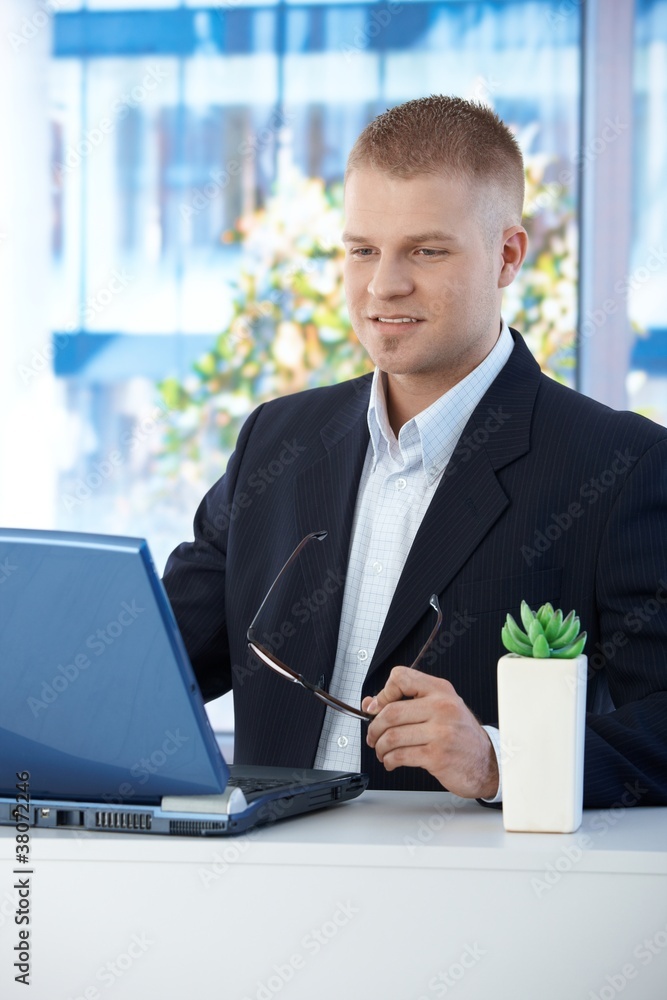 Young businessman at work Young businessman at work