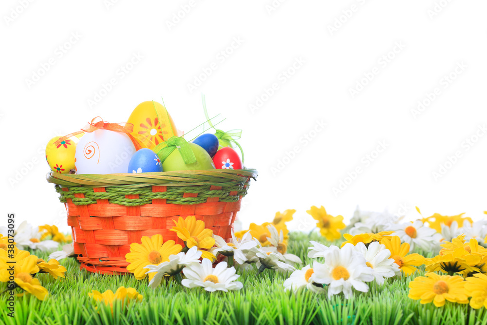 basket with easter eggs on a meadow basket with easter eggs on a meadow