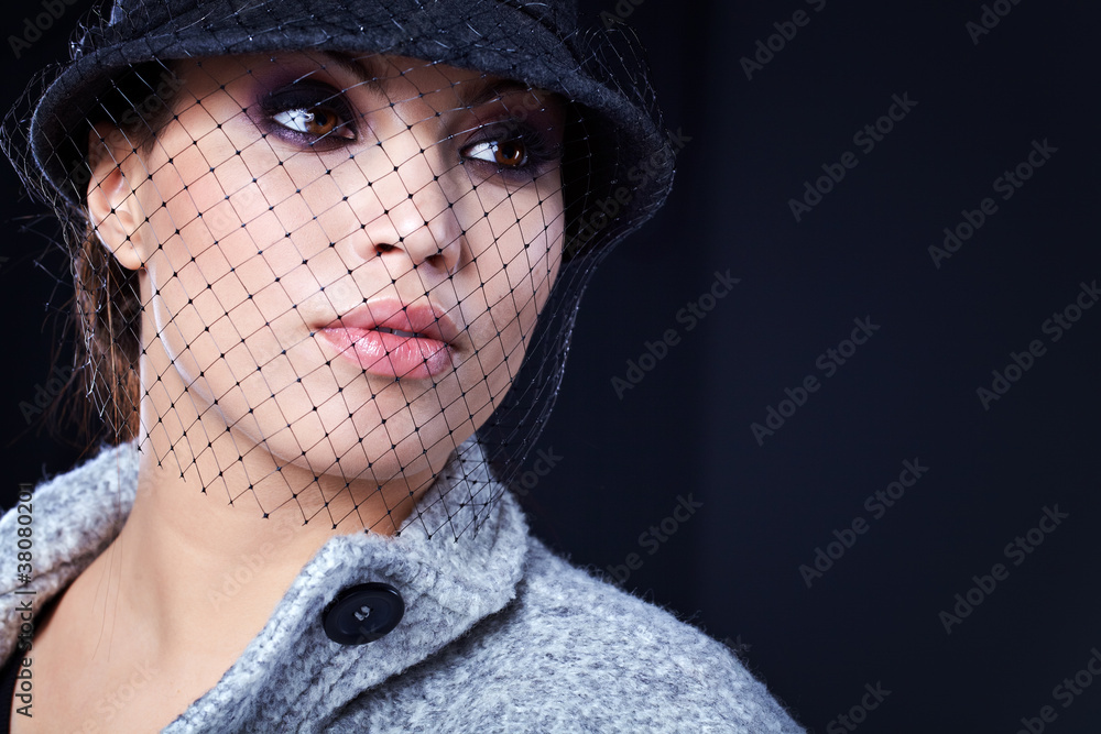 Fashion Beautiful Woman over grey background Fashion Beautiful Woman over grey background