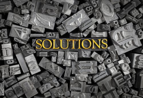 Solutions spelled out in metal letters photo