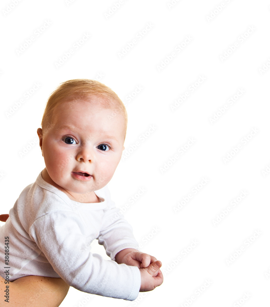 Isolated beaufiful caucasian infant baby behind whiteboard Isolated beaufiful caucasian infant baby behind whiteboard