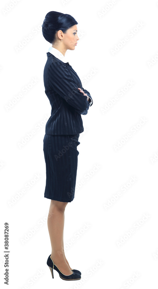 Full length, side view of a confident young Full length, side view of a confident young