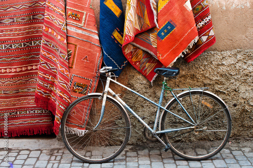 Bicycle and carpets on the street of Morocco