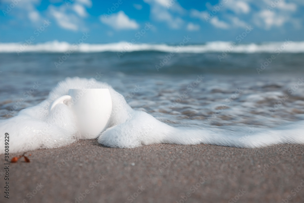 espresso coffee in white cup with ocean wave, beach and seascape espresso coffee in white cup with ocean wave, beach and seascape