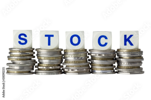 Stacks of coins with the word STOCK isolated