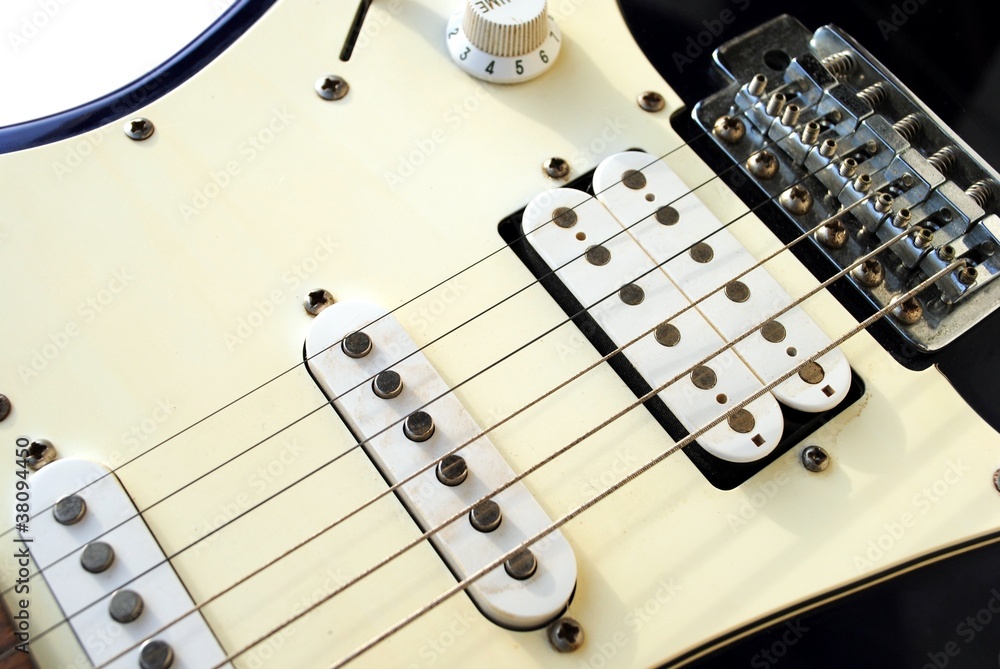 Fototapeta premium close up of an old style electric guitar