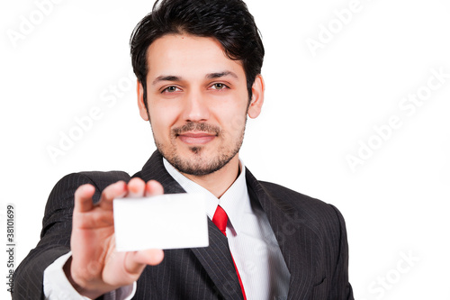portrait of arab businessman holding visiting card