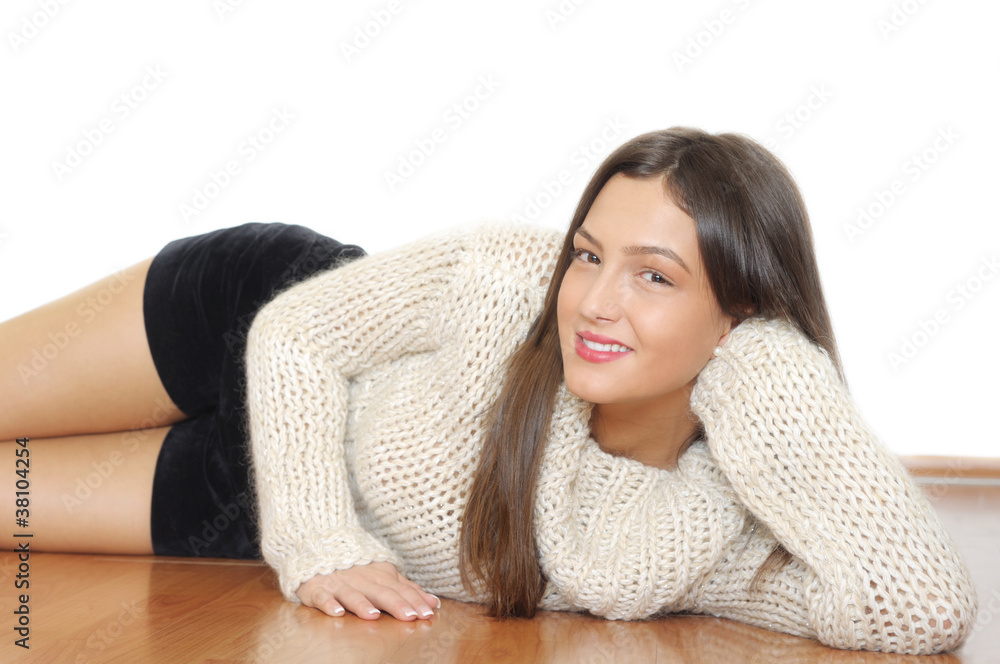 portrait of a smiling young woman on the floor portrait of a smiling young woman on the floor