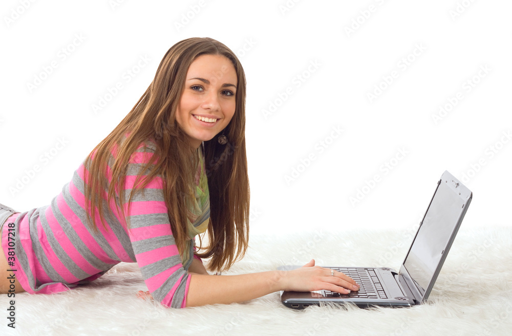 Woman with a laptop computer - isolated over a white background Woman with a laptop computer - isolated over a white background