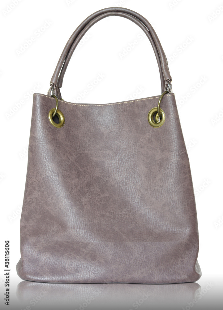 Women leather bag on reflect floor and white background Women leather bag on reflect floor and white background